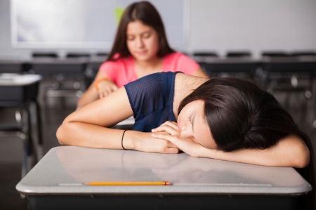 teen sleeping in class